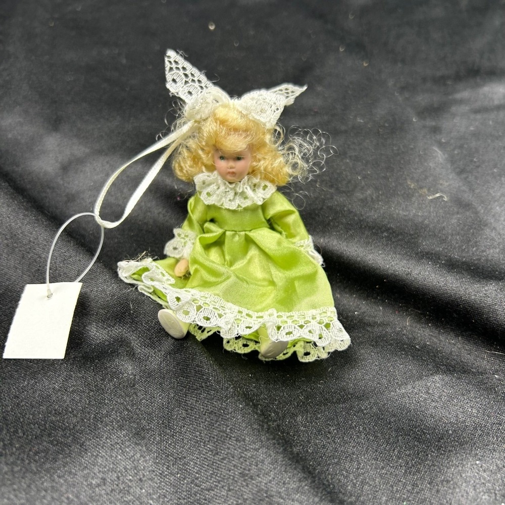 Miniature Porcelain Doll Ornament Blonde Hair Green Satin Lace Dress Figurine